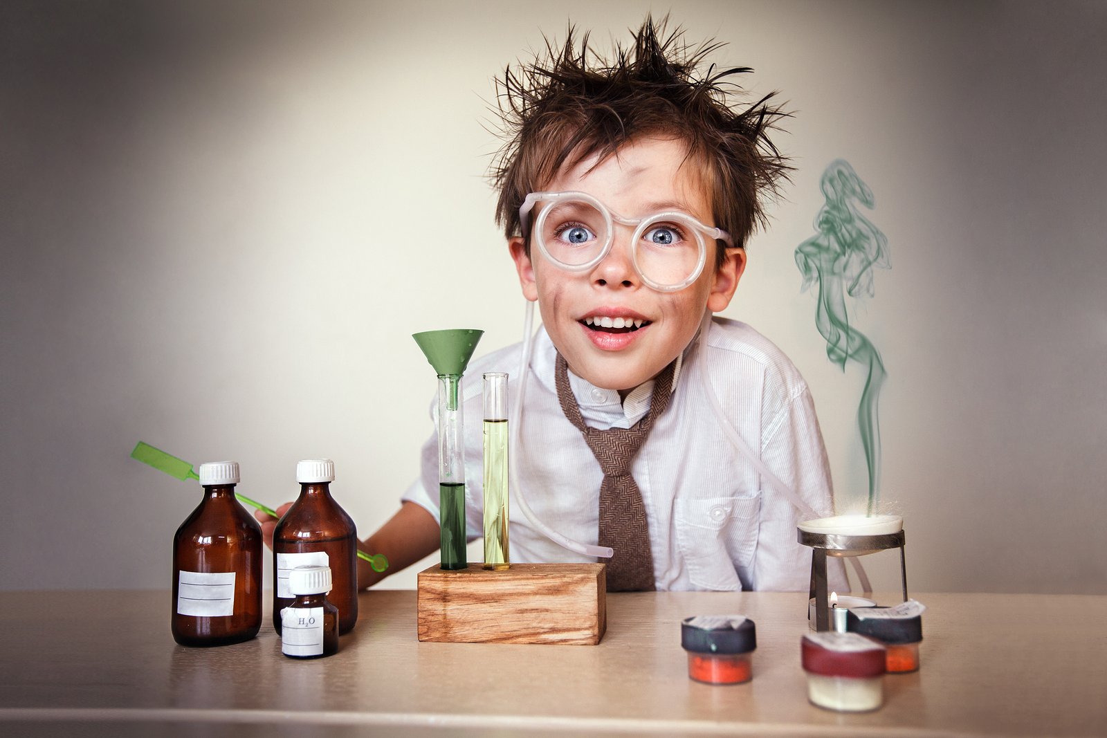 Young boy performing experiments.