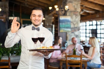 Waiter showing ok sign