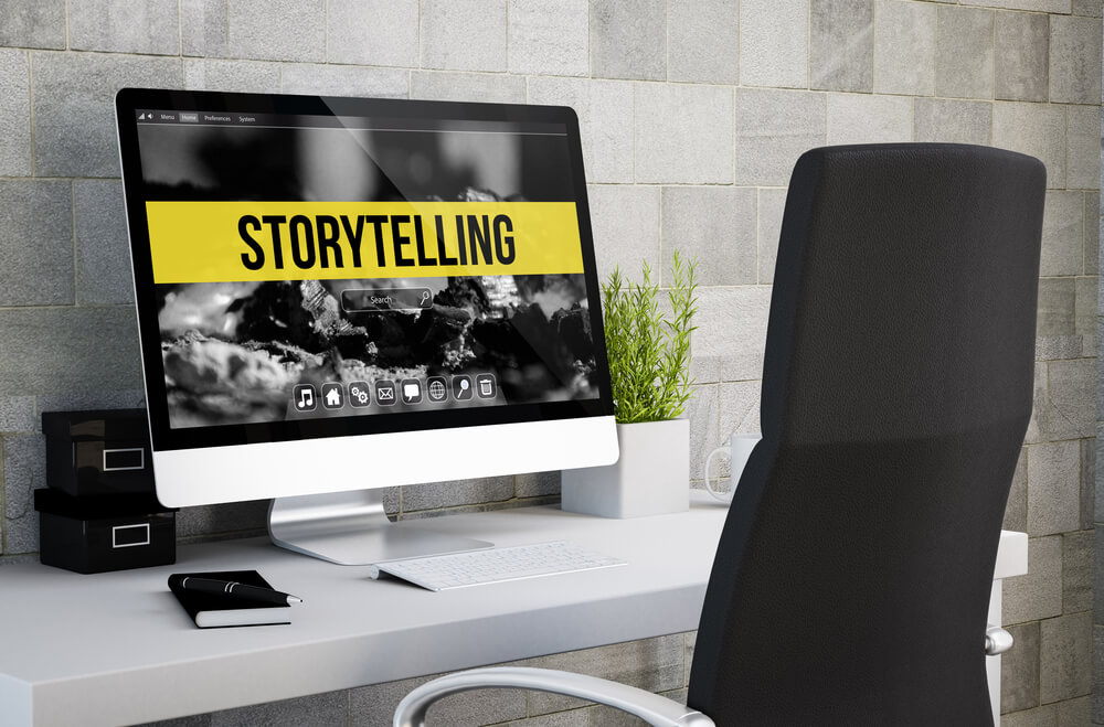 computador com tela e título sobre storytelling