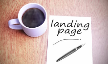 Coffee on the table with note writing landing page