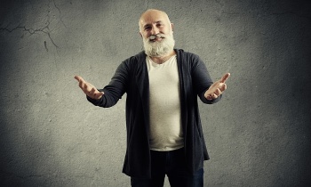 man friendly pulling hand to the camera