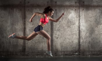 Side view of running woman