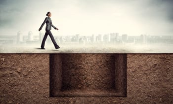 Woman near a deep pit