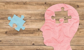 mental health concept with side face and jigsaw pieces
