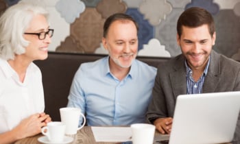 Positive sales manager working with his clients.