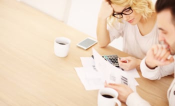 Adult couple working on documents