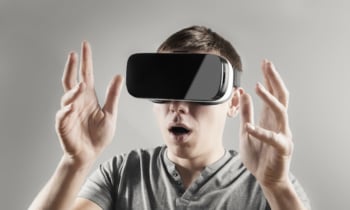 Young man in virtual reality, vr glasses.
