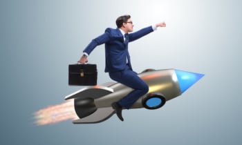 Businessman flying on rocket in business concept