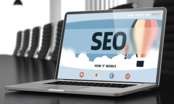 SEO – on Laptop Screen. Closeup. 3D.