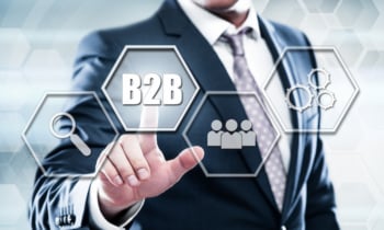 Business, technology, internet concept on hexagons and transparent honeycomb background. Businessman pressing button on touch screen interface and select b2b