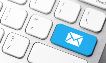 Email & contact us icon on computer keyboard