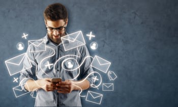 Man using smartphone with email network