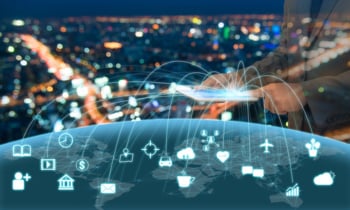 businessman in brown suite using tablet control the world , internet of things concept