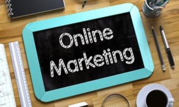Online Marketing Concept on Small Chalkboard. 3D.