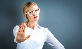 Young woman making a rejection pose