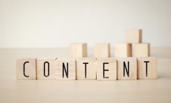Content word on wooden cubes background