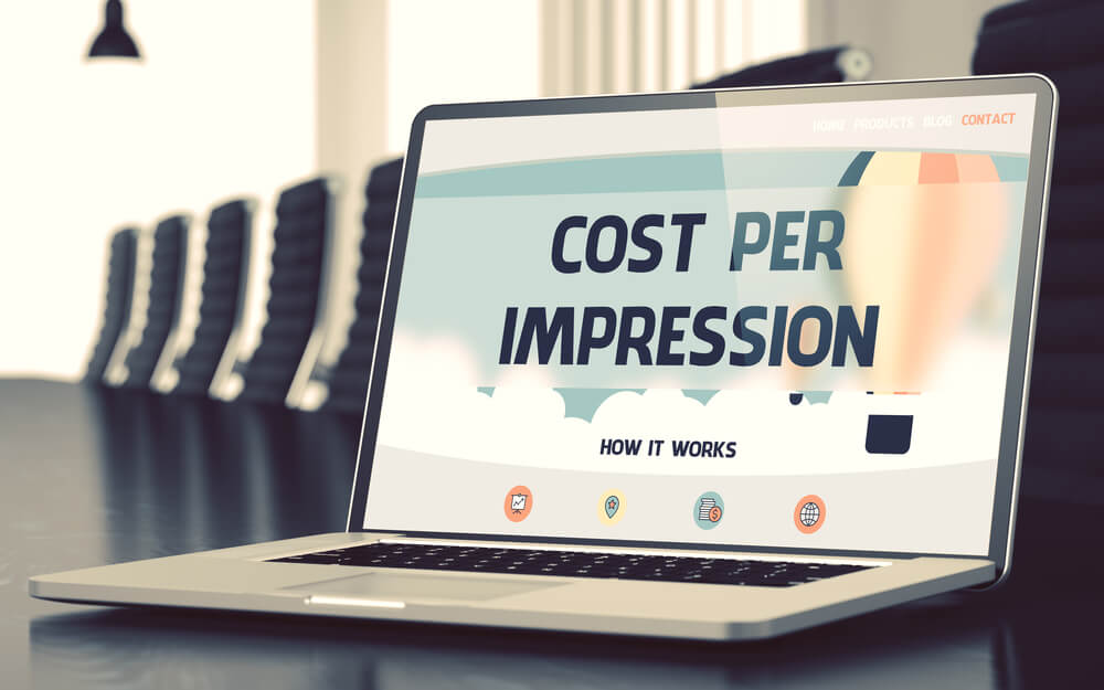 laptop com titulo cost per impression na tela