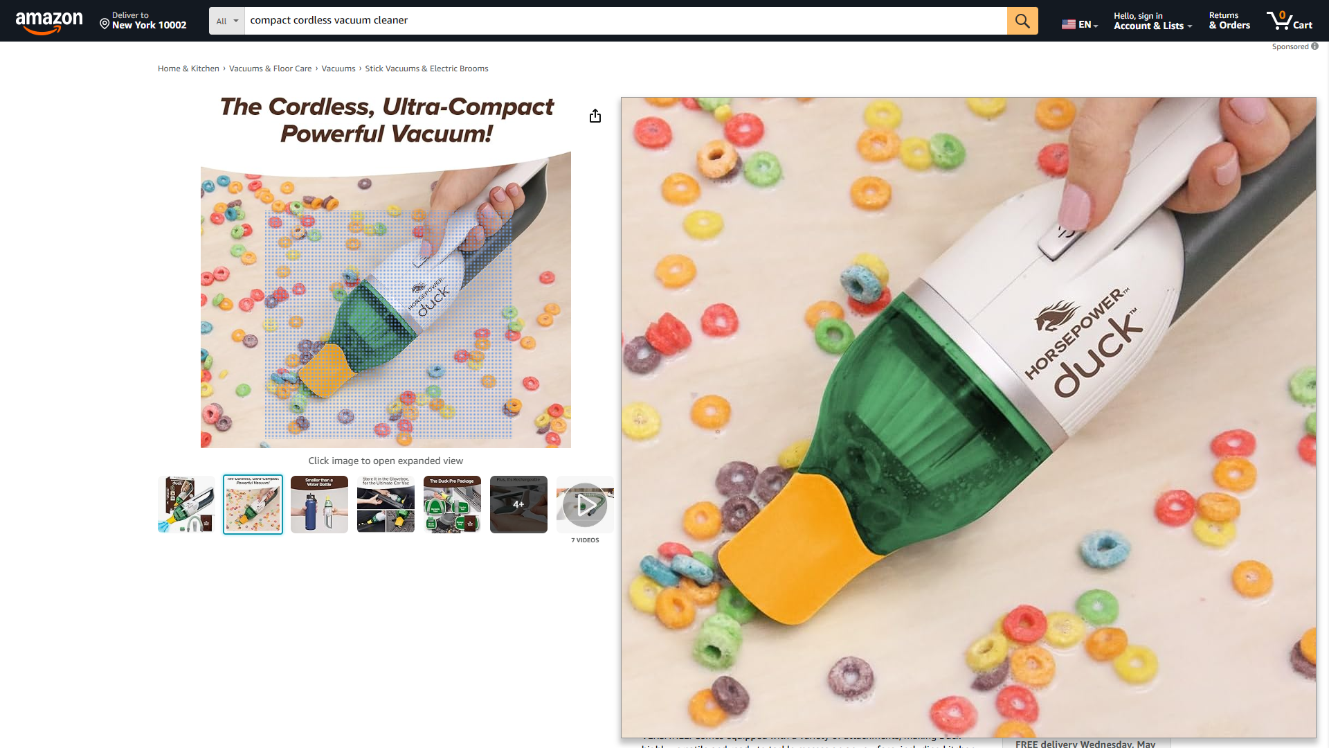 Zoomed in image on Amazon of a compact cordless vacuum.