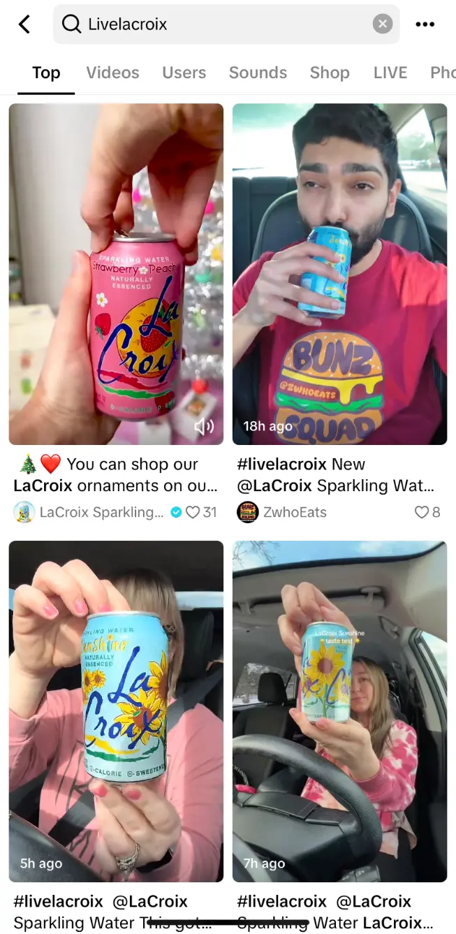 Dynamic SEO Pro TikTok search results for “Livelacroix”, displaying top videos. Thumbnails feature creators holding different LaCroix cans inside their cars, demonstrating taste tests or casual product demos.