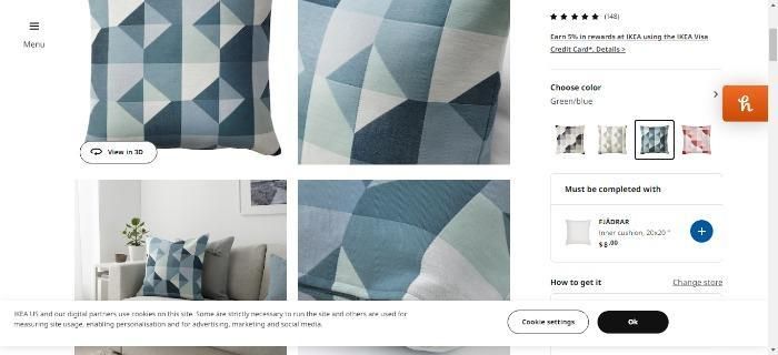 Blue and white throw pillows on Ikea's product page.