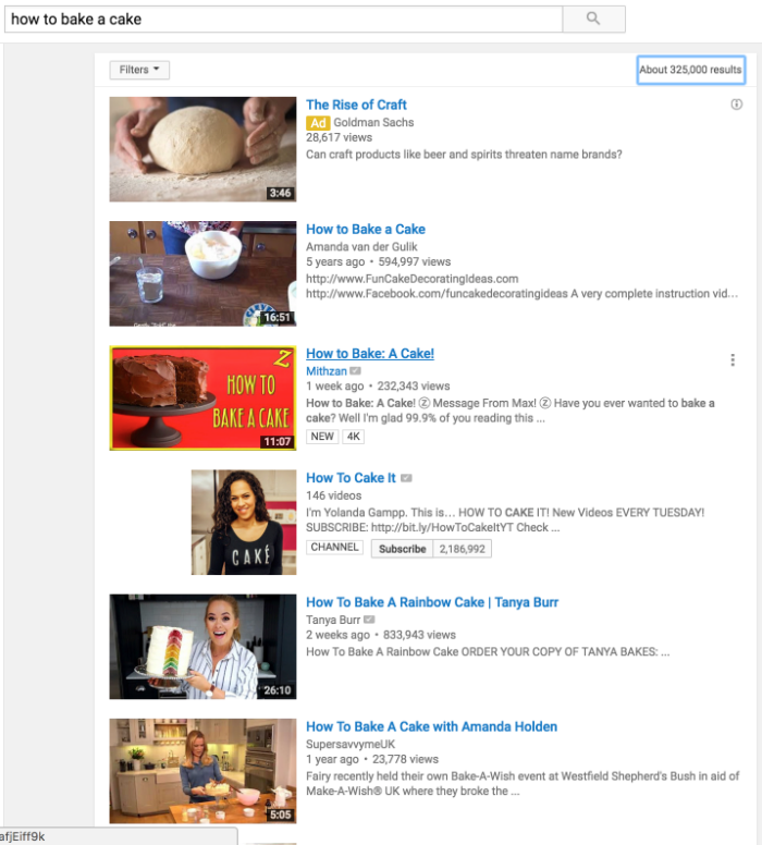 Screenshot of a YouTube search that says, "how to bake a cake" in the search box.