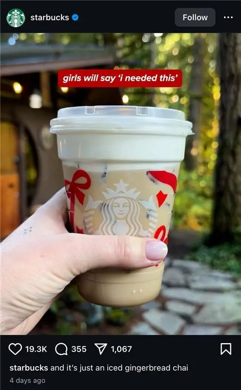 Instagram photo from Starbucks featuring a hand holding an iced gingerbread chai drink with the caption “and it’s just an iced gingerbread chai.