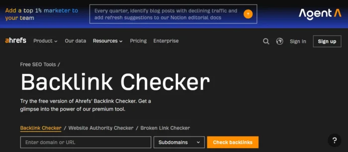 Ahrefs Backlink Checker homepage offering a free trial version. 