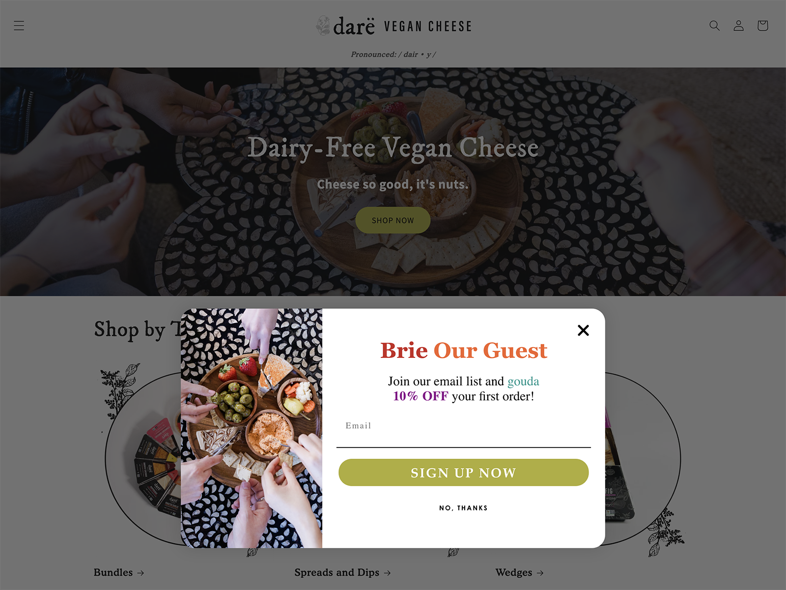 Dare vegan cheese with a popup that says "brie our guest."