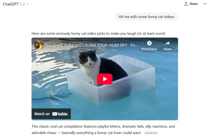 ChatGPT interface responding to the prompt ‘Hit me with some funny cat videos’ by embedding a YouTube video thumbnail of a cat sitting in a plastic container in water. 