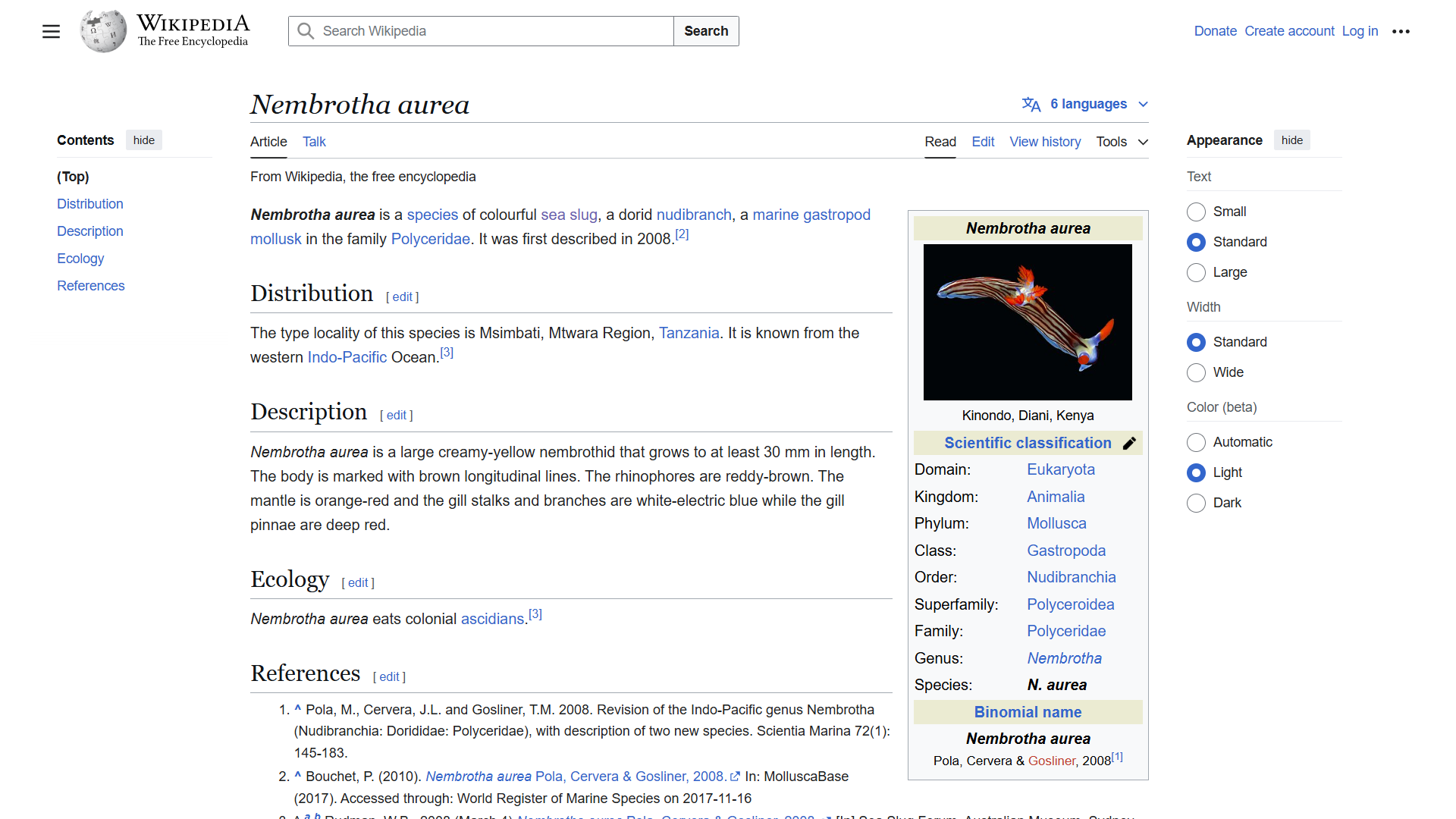 Wikipedia page for Nembrotha aurea.