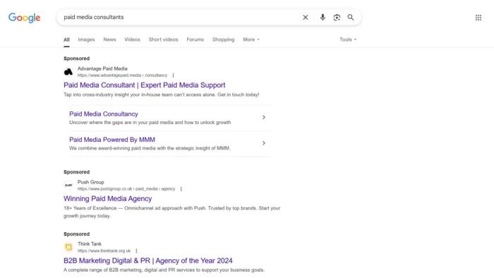 Search engine ads for the keyword "paid media consultant."
